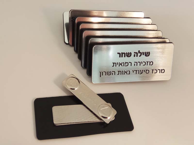 פי סי גרף  חריטה והדפסה על מוצרים.